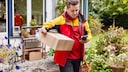 Die DHL hat die Paketmitnahme ausgebaut. Sie lässt sich jetzt anmelden und funktioniert auch von einem Ablageort aus.