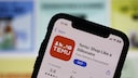 Symbolbild: Smartphone mit der Temu-App im Appstore