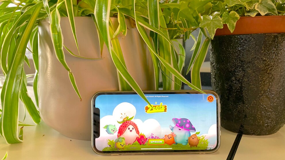 Mobile Game Zeedz Startbildschirm auf Smartphone