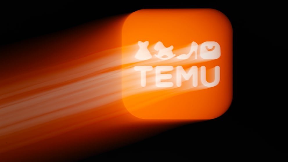 Temu Bewertungen Vorsicht: leicht verschwommenes orangefarbenes Logo des Online-Händlers Temu