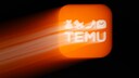 Temu Bewertungen Vorsicht: leicht verschwommenes orangefarbenes Logo des Online-Händlers Temu