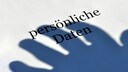 Schatten einer Hand über den Worten "persönliche Daten".