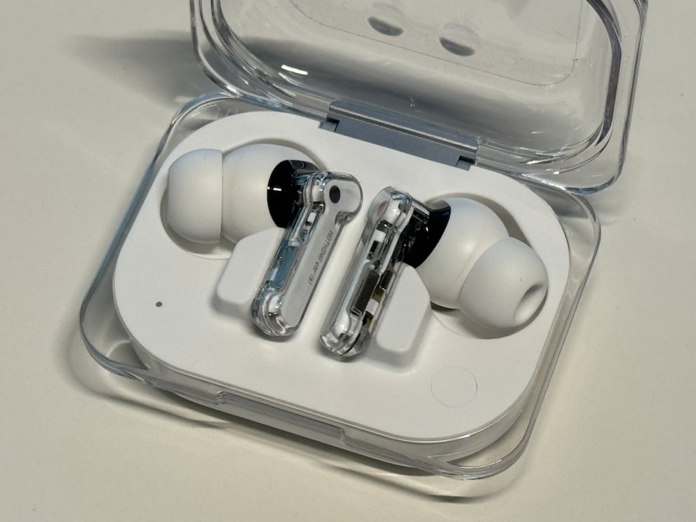 The Nothing Ear (a) in their charging case
