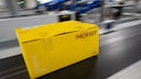 Die DHL plant eine Sondergebühr für Pakete