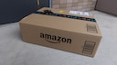 Ein Amazon-Paket vor einer Haustür