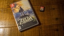 Verpackung und Spielkarte zu „Zelda: Breath of the Wild“