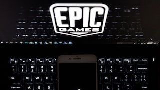 Laptop mit Epic Logo und Apple Smartphone