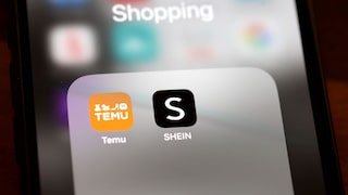 Smartphone mit Temu und Shein Logo