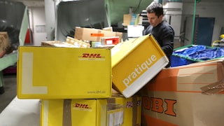Die DHL Group fordert erneut eine 23‑Kilo‑Grenze für Pakete