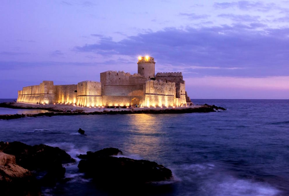 View of the fortress of Le Castella in the evening light