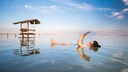 Tourist im Toten Meer / Dead Sea in Israel