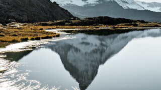 Schweiz. ganz natuerlich. Abendliche Sicht vom Riffelsee auf das Matterhorn.