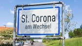 Ortsschild von Corona am Wechsel