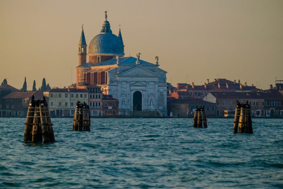 The elongated island of La Giudecca is located opposite St. Mark's Square. Here you can take a leisurely stroll and enjoy a great view of the city center.