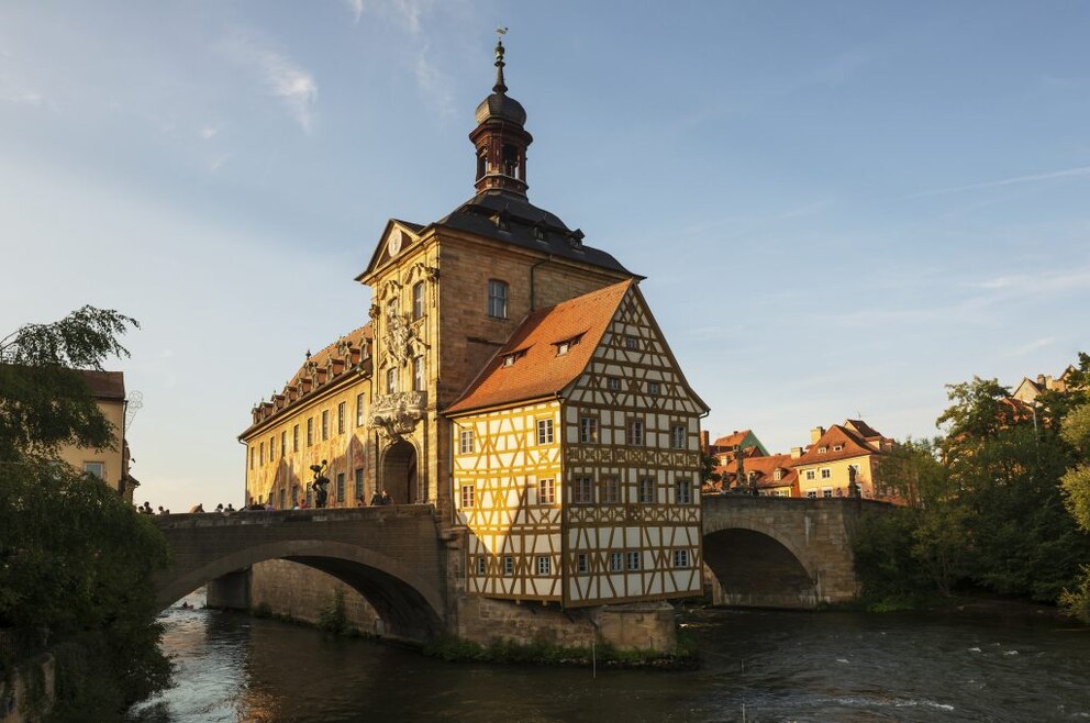 The Old Town Hall in Bamberg stands in the middle of the Regnitz River and is a unique attraction–a sightseeing highlight for tourists