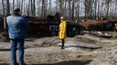 Posen vor zerstörten Panzern – sieht so der neue Tourismus in der Ukraine aus?