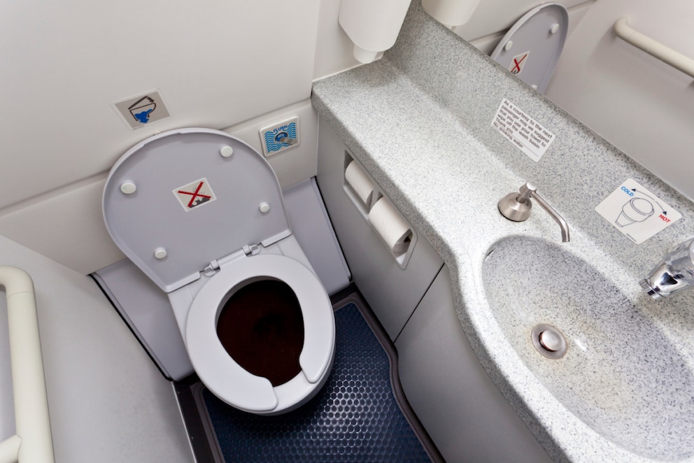 Vacuum toilet in airplane