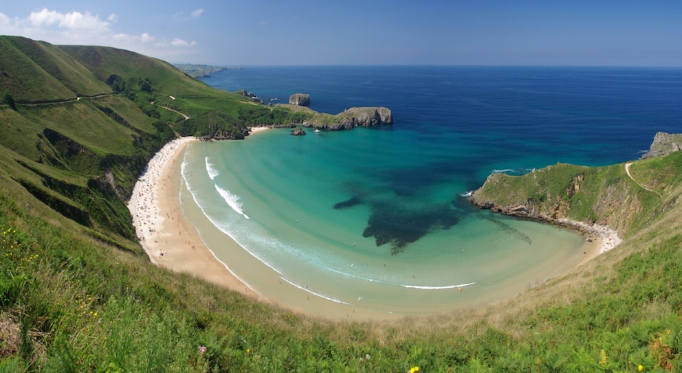 Playa de Torimbia is located on the Costa Verde in Asturias near the small town of Llanes