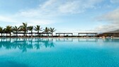 Wer den ganzen Tag im Pool oder am Strand abhängt, ist mit einem All-inclusive-Urlaub besser beraten als mit Halbpension