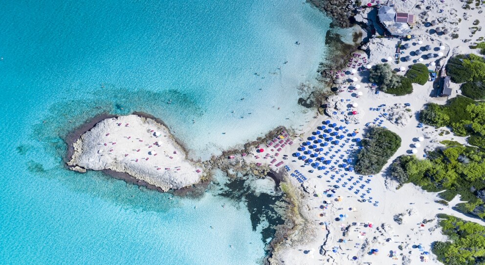 The Punta della Suina beach is located south of Gallipoli and is known for turquoise water, a great destination for a September vacation