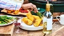 Veganer haben es nicht leicht im Urlaub. Den Maiskolben als Snack kann man aber auch ohne Butter bestellen