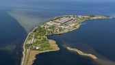 Auf den ersten Blick wirkt die Ostseeinsel Riems wie eine Ferieninsel, doch der Schein trügt