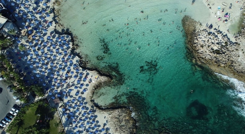 The beach in our title photo is called Nissi Beach and is located in Ayia Napa