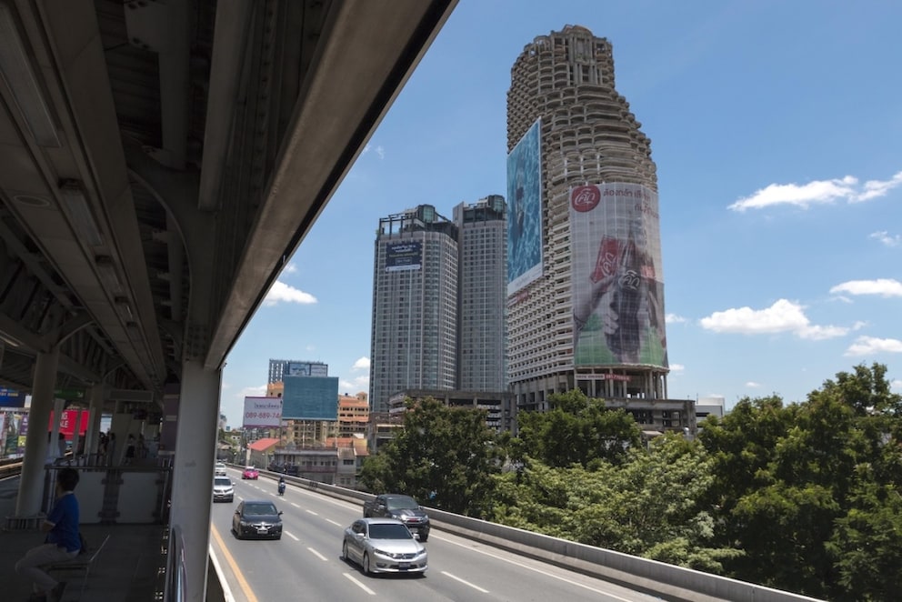 The Sathorn Unique Tower is Bangkok's unofficial landmark and serves as an oversized advertising space