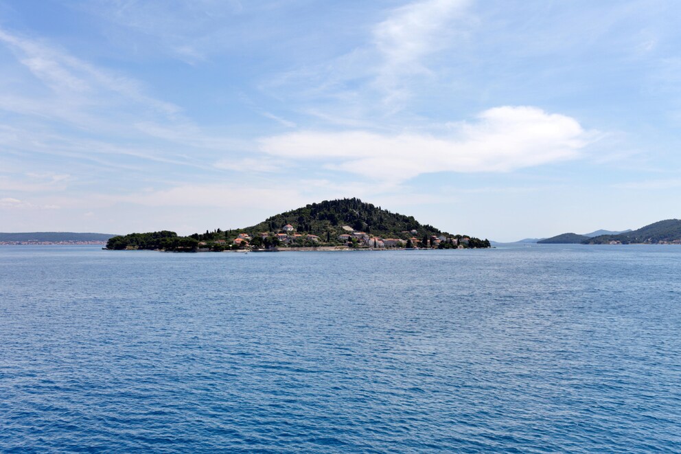 This is the view of Ošljak tourists have on the boat route