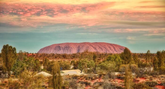 Uluru (also: "Ayers Rock") is a red sandstone in the Australian Outback and is considered a landmark of the continent and a sacred site for the indigenous people