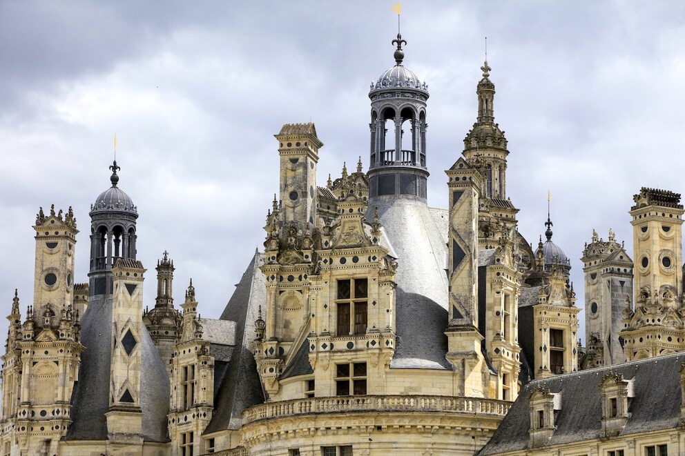 Six large towers and countless roofs adorn the castle