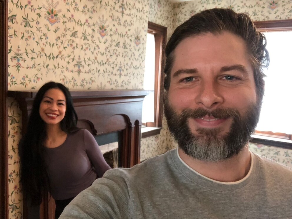 The happy couple beaming in their Bissell Mansion–no trace of fear