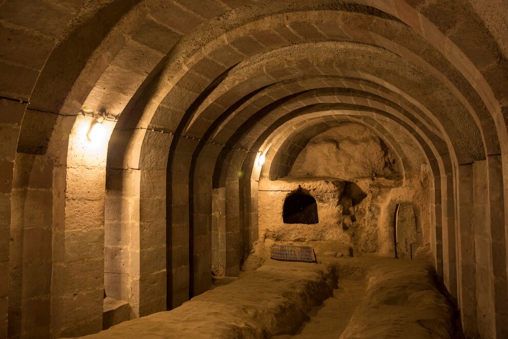 While most rooms have bare stone walls, others–like this chapel–were elaborately equipped with arched ceilings